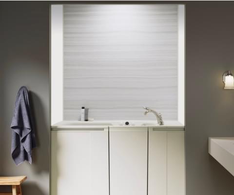 view of walk-in bath with vien cut dune and white wall surround