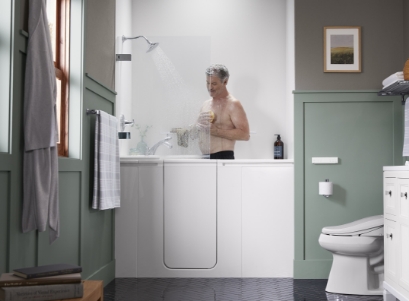 man standing in tub shower combo package