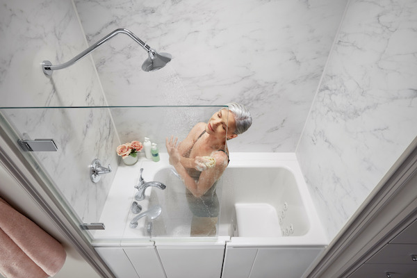 overhead view of woman bathing in shower